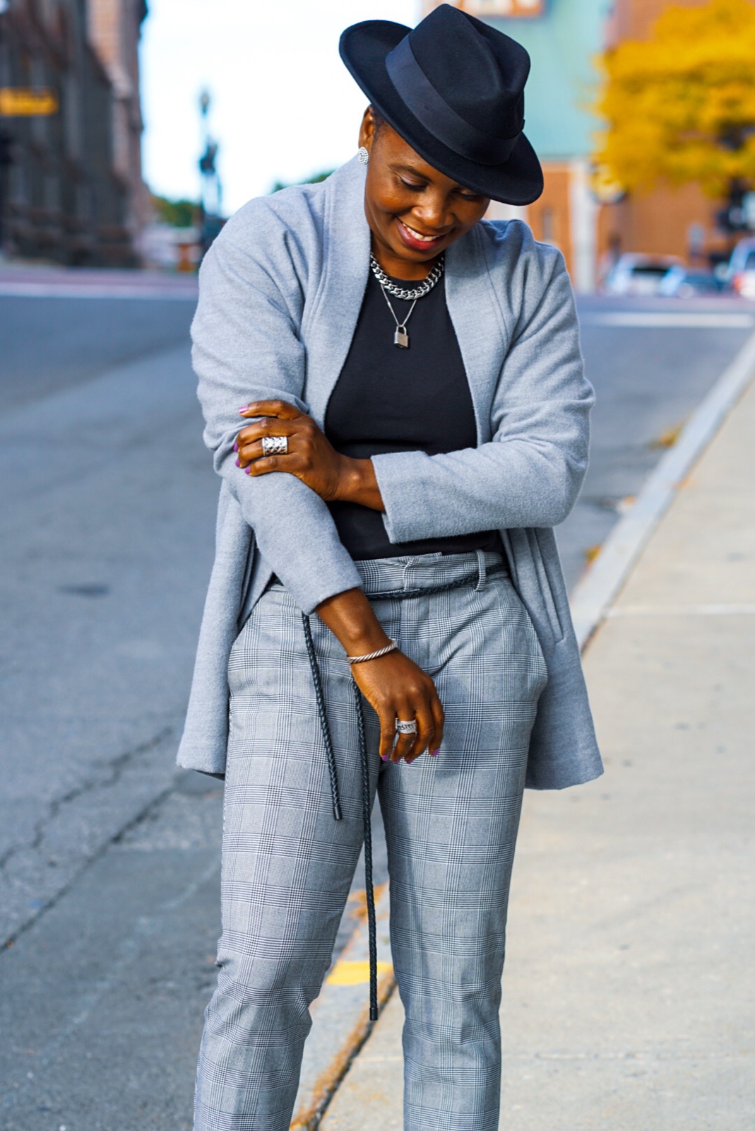 Mo, owner of European Tailoring, in a tailored grey check suit